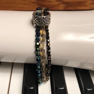 Triple bead-strand bracelet